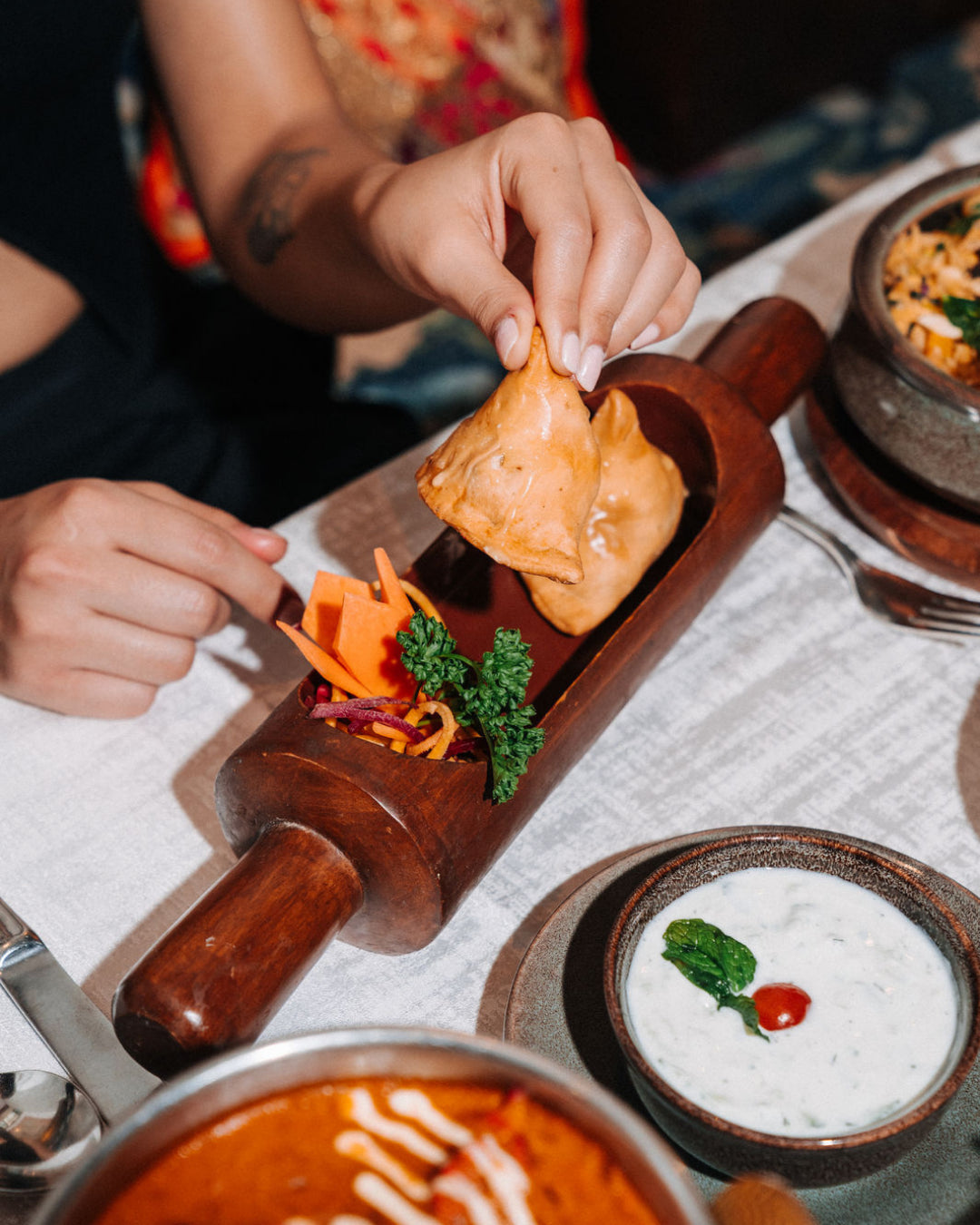 Samosas on the wooden board